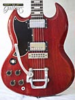 Photo Reference vintage left hand guitar electric Gibson SG Trans Red with Bigsby 1974