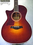 Photo Reference used left hand guitar acoustic with electronics Taylor 714CE Cutaway Sunburst
